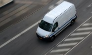 Fast moving truck on asphalt road